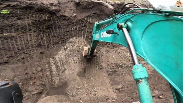 Строительство, экскаватор копает песок смотреть онлайн