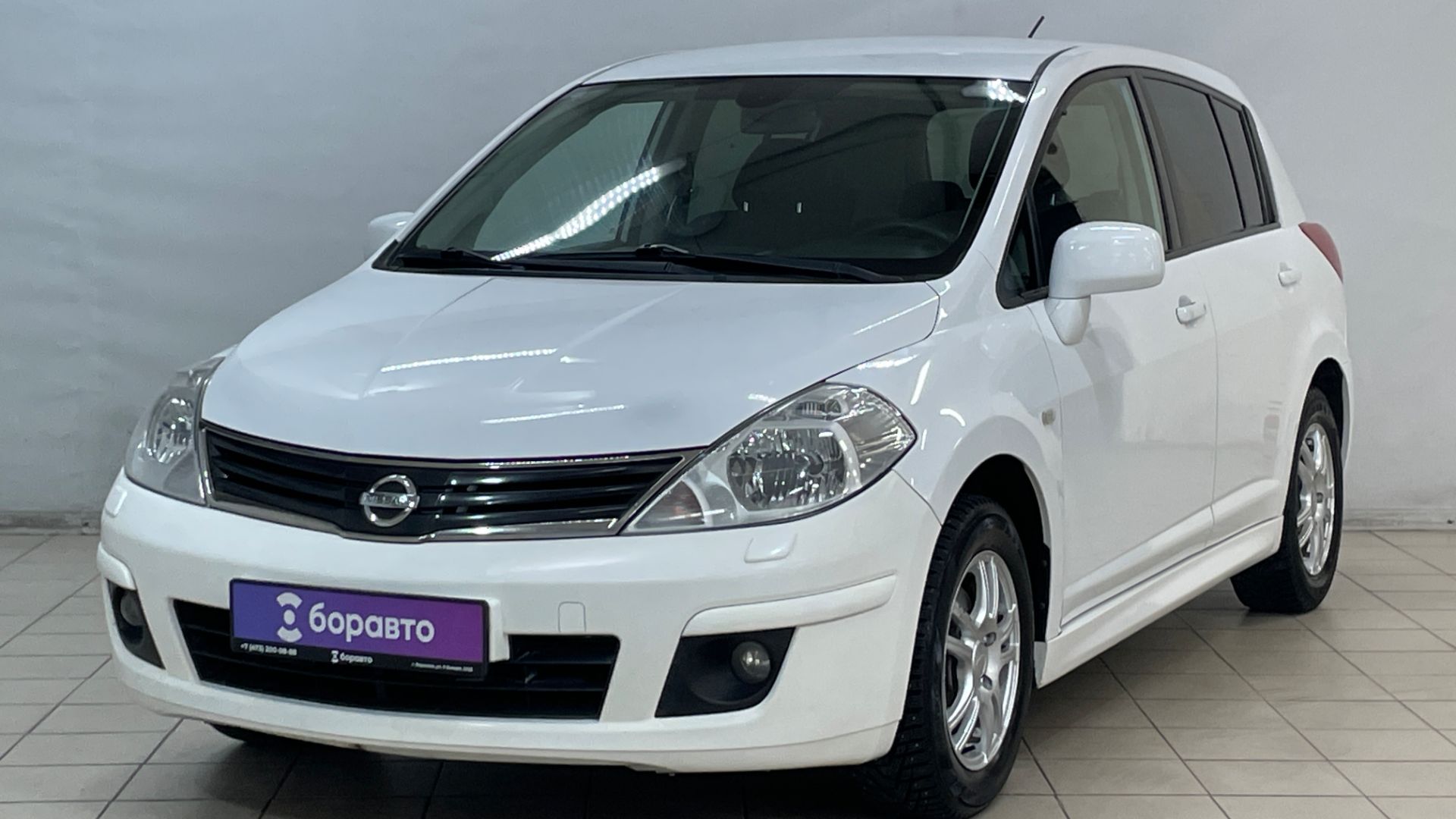 NISSAN TIIDA смотреть онлайн