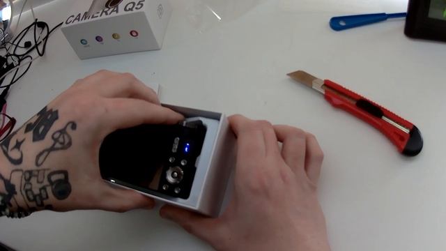 Распаковка цифрового фотоаппарата  W&O  DMC-TSS