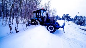 Расширяю дорогу от заносов на тракторе МТЗ-82.1.