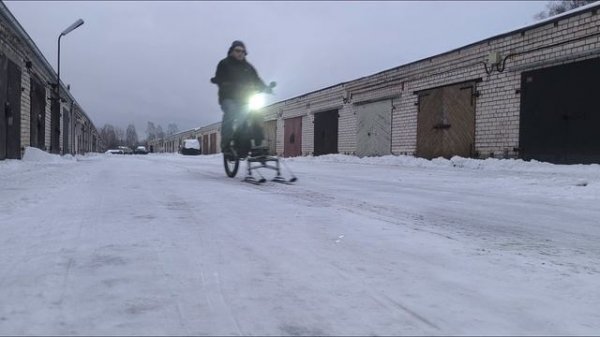 Electric bicycle with skis