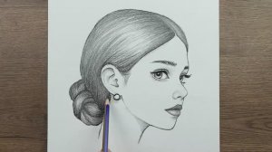 Простой портрет карандашом, как шаг за шагом нарисовать красивую девушку с шишкой в волосах