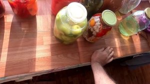 Банки с соленьями из погреба в январе