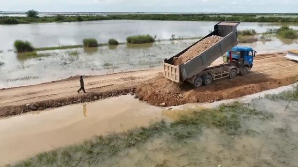 Komatsu Bulldozer Repair The Road On Water With Strong 25T Dump Trucks