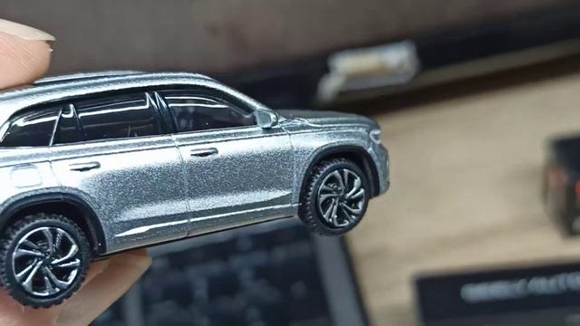 Geely Monjaro'2021 (Xingyue L) 4Rhythm. 1-64 Bburago. Серый