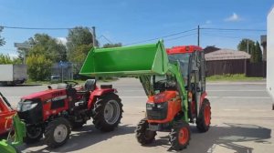 Минитрактор Kubota с челюстным погрузчиком
