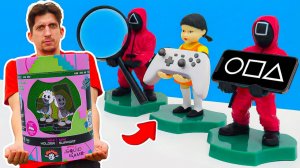 Кукла для детей из Игра в кальмара похищена!❌❓ Подставки под гаджеты OJM спешат на помощь!