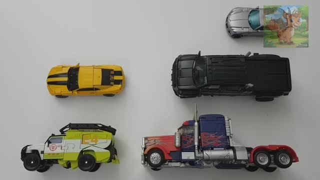 Игрушки из фильма Трансформеры и жестяная трещотка Оптимуса Прайма Бамблби Джаз-Трансформеры смотреть онлайн