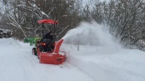 Минитрактор для чистки снега с отвалом и снегоротором