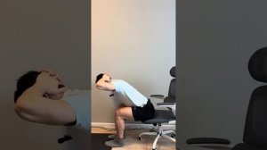 Разгибание позвоночника сидя на стуле