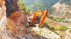 Excavator Backhoe Cutting Rocky Hillside to Build a Narrow Mountain Road ep-5