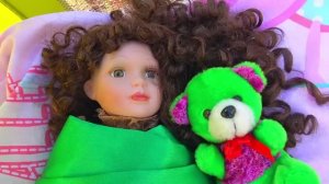 Nastya Plays with colored toys