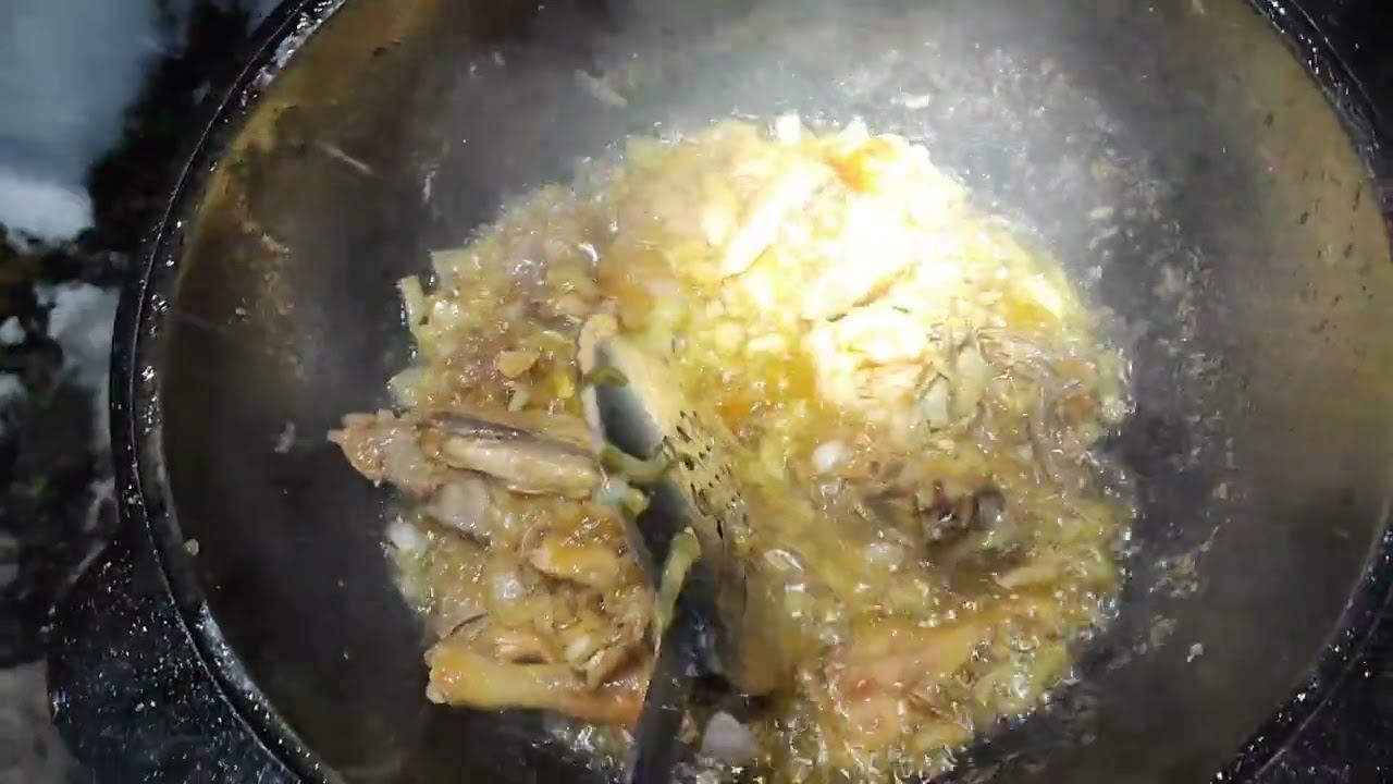 Петух в казане.