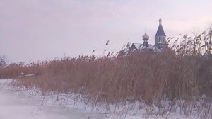 Зимний пейзаж с  монастырем