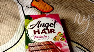 пробую шоколад волос Ангела