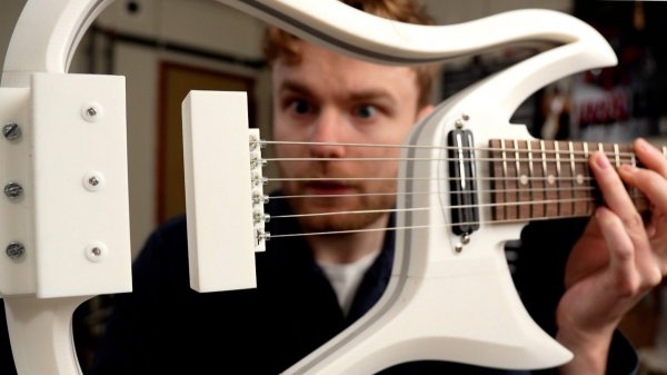 Magnetically Hovering Guitar Strings