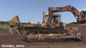 Белазы, бульдозер ЧЗПТ Т-330 и экскаватор ЭО-5221. Карьер. Подготовка участка