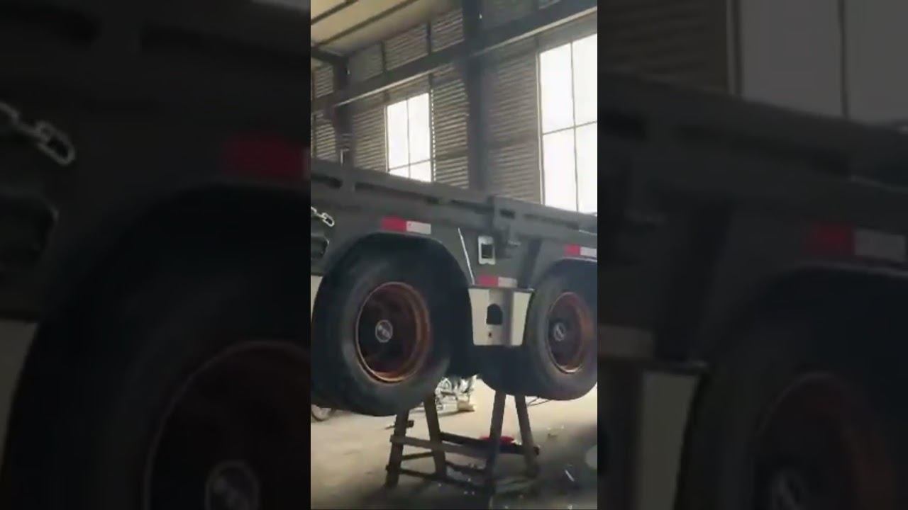 Трал низкорамный  , 6 осей , 2 подъемных , грузоподьемность 70 тонн .