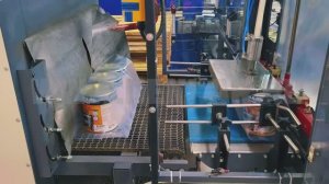 Упаковка банок с краской на плоской подложке. ДЭНКАР.