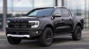 Пикап Ford Rangеr Wildtrak чёрный с обвecом RАРТOR