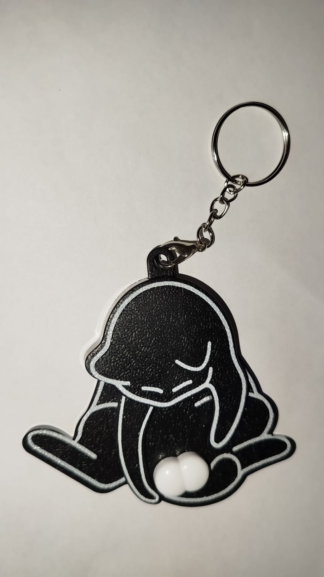 Брелок играющего кота