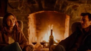 Горит в окне огонь свечи