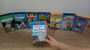 Видеокассеты vhs с му мультфильмами в боксах.