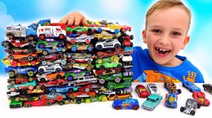 Влад и Никита играют с детскими машинками  Hot Wheels City Слайм Челлендж