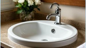 Как прочистить отверстие перелива в раковине.