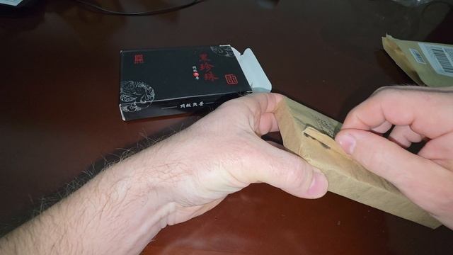 Чай Шу Пуэр Юн Чжень "Чёрный жемчуг" от фабрики Синь Вэнь, кирпич 250 гр смотреть онлайн