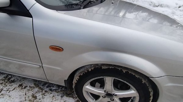 Обзор мазда фамилия