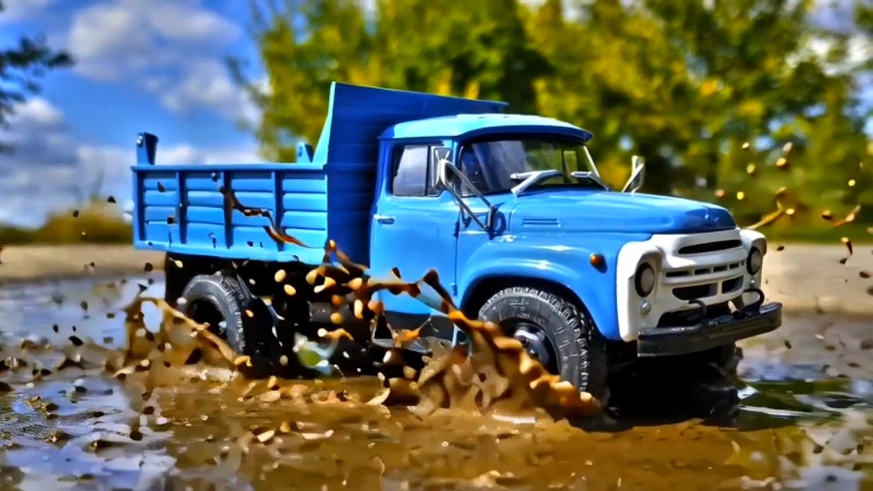 Грузовики самосвалы работают на макете. Про машинки смотреть онлайн