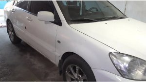 Замена передних рычагов Mitsubishi Lancer 9