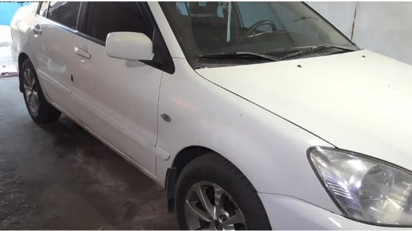 Замена передних рычагов Mitsubishi Lancer 9