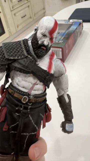 Распаковка фигурки кратоса из игры God Of War 2018.