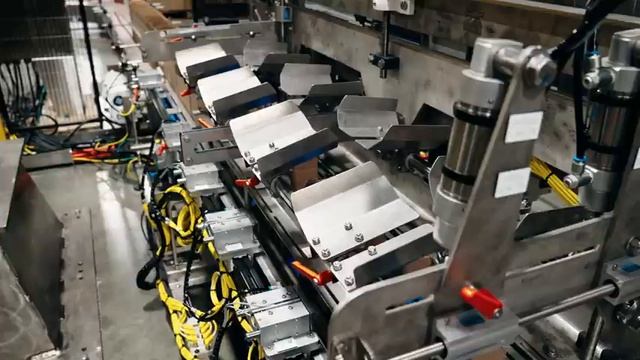 Pearson — Robotic Case Packing and Palletizing for Plastic Bottles of Soap by Pearson Packaging