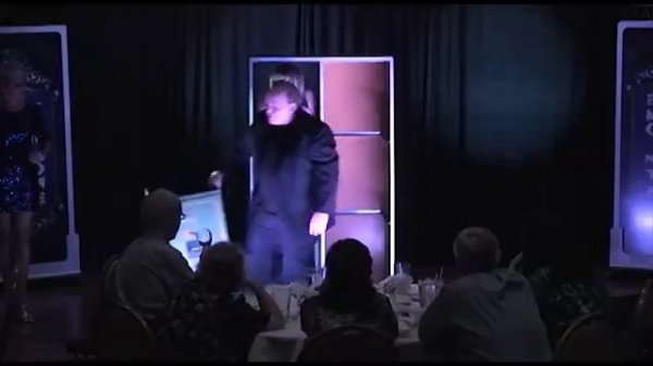 Magician Michael Clayton performs Houdinis File Cabinet with former Miss America Kellye Cash during