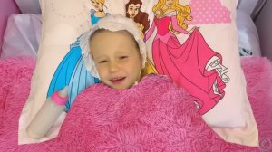 Nastya found a doll and pretends to be a parent