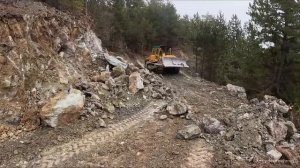 Как бульдозер Caterpillar D7G пробирался сквозь камни?