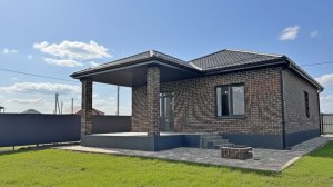 Новый дом с террасой и отделкой