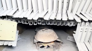 Производство прочных подставок для швейных машин из старых бочек.