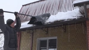 приспособа для удаления снега с навесов