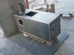 Сварил металлическую печку в баню .