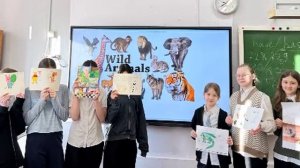 Ольга Степановна Базько представляет отчет о конкурсе в 5-6 классах 'Books about Animals'