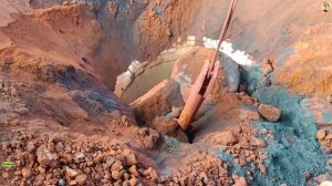 Строительство, конусная дробилка Кобелко, очистка воронки от руды