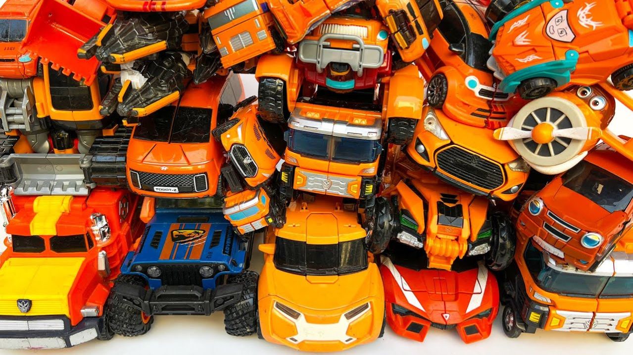 Полностью оранжевого цвета Трансформеры Тобот Карбот