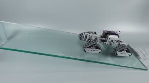 Вождение автомобилей Lego по скользкому склону Driving Lego Vehicles Up A Slippery Slope