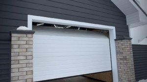 Автоматические секционные ворота в гараж