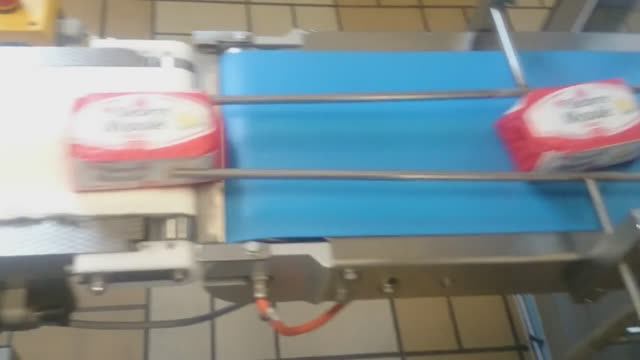 Фасовка масла сливочного в пачку овальной формы