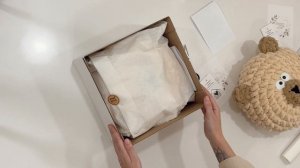 Упаковка подушки-кругляша медвежонок